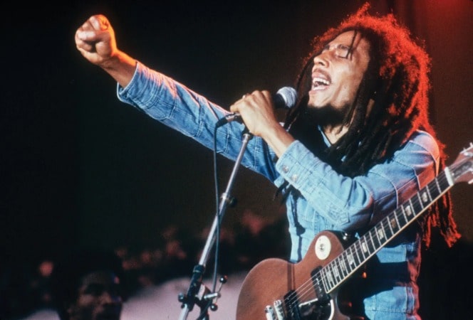 Portrait of John Naste Marley's grandfather Bob Marley doing a live concert 