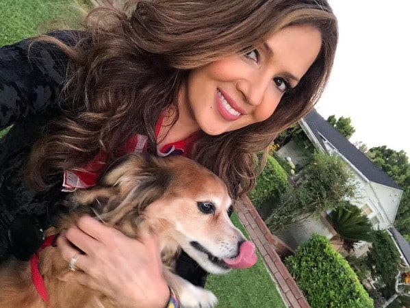 Maria Canals-Barrera with her pet dog Honey 