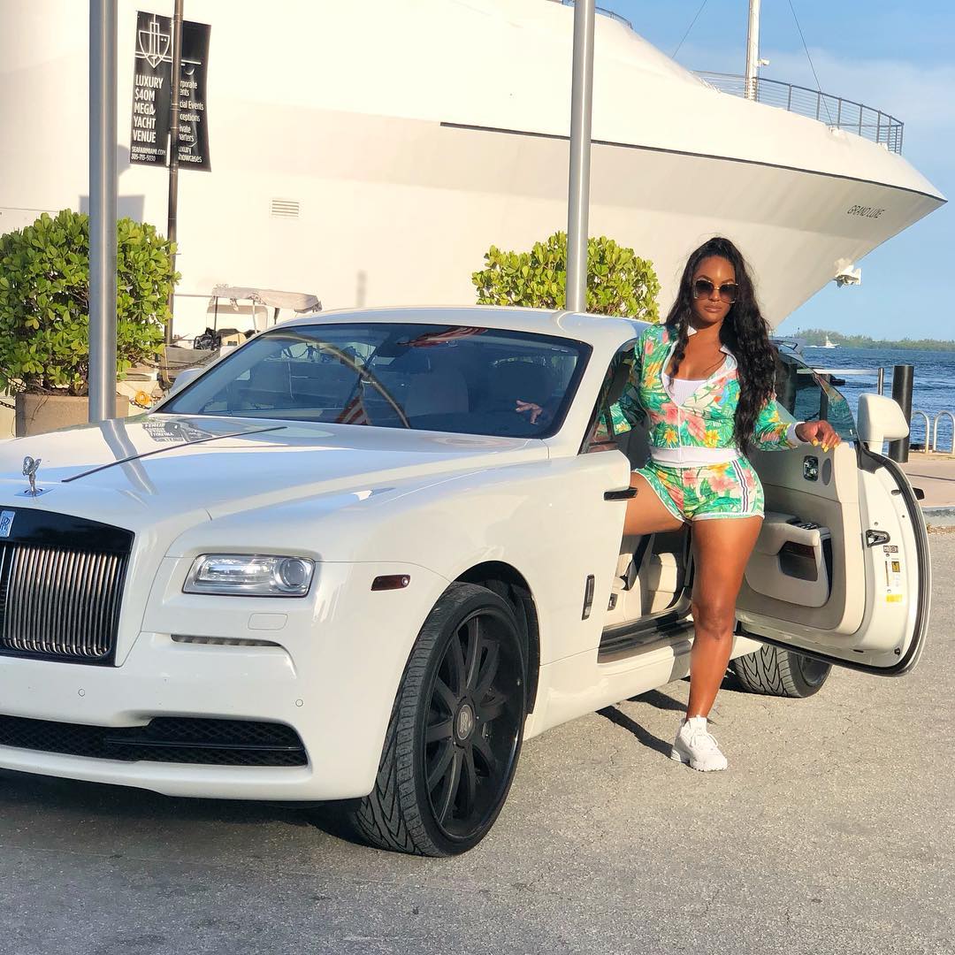 Picture of Brandi Maxiell and her Rolls-Royce Wraith