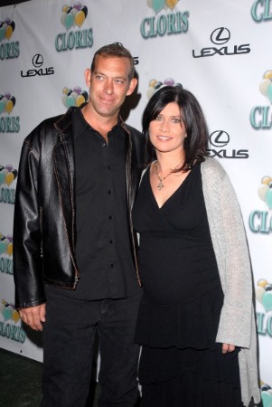 Nancy Mckeon wearing black clothes and white outer and her husband Marc Andrus weraing black clothes in series 