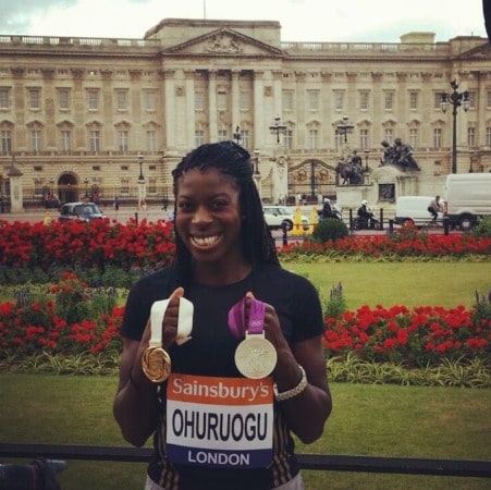 Christine Ohourogu showing her gold and silver medals
