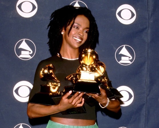 Joshua Omaru Marley's mother Lauryn Hill with grammies in her hand 