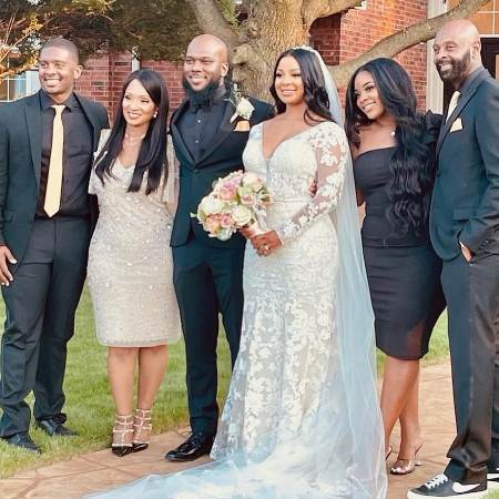 Jada Rice alongside her siblings and parents on her big sister, Jaqui Bonet's wedding.