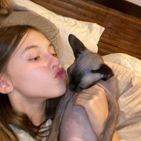 Maisie De Krassel loves her pet cat.