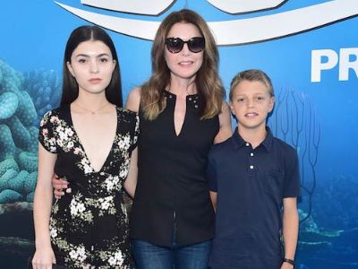 Jane Leeves is in the middle holding both her kids, Isabella Kathryn Coben and Finn William Leeves Coben.