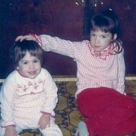 An old picture of Lisa Locaicno with her older sister, Sharon.