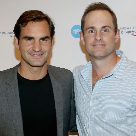 Andy Roddick with the tennis player Rodger Federer.