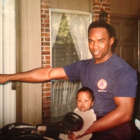A photo of Darius Benson with his father during his lifetime