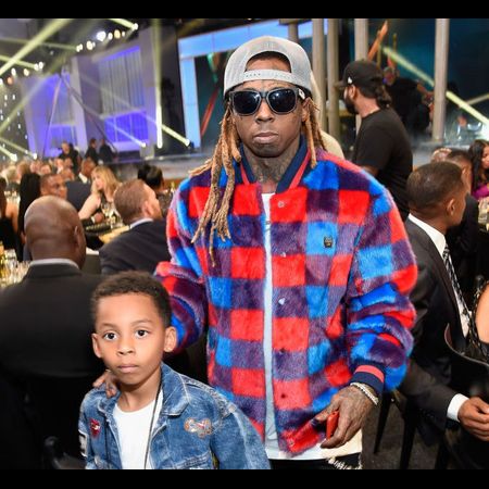 Kameron Carter and his rapper father Lil Wayne.