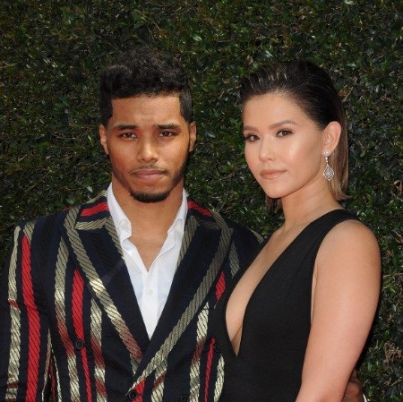 Rome Flynn with his former romantic partner Camia Marie.