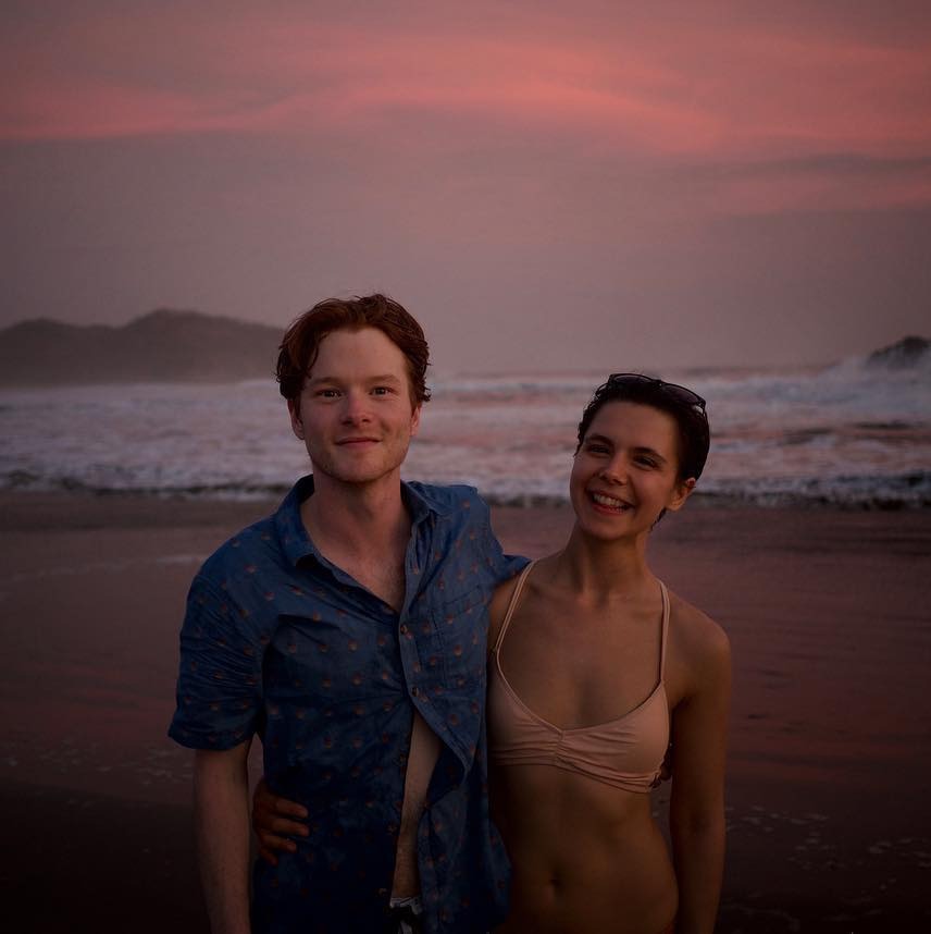 Paloma Kwiatkowski at the beach with her boyfriend Curtis Tweedie.