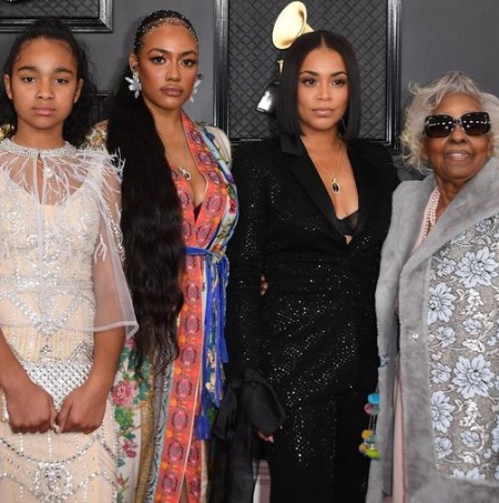 Emani Asghedom with her aunts and Nipsey Hussle's grandmother Margaret Bouffe.