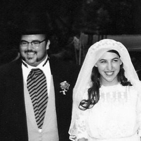 The marriage ceremony picture of Mayim Bialik and Micheal Stone.