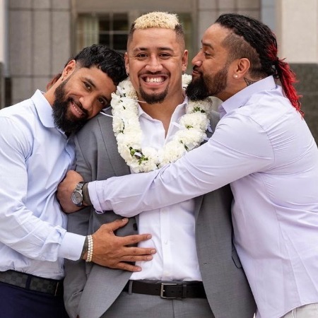 Solo Sikoa with his brothers Jimmy Uso and Jey Uso.