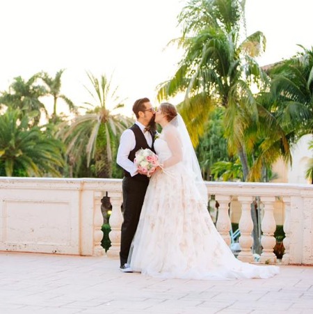 The lovely marriage ceremony picture of Christie Ashenoff and Argelio.