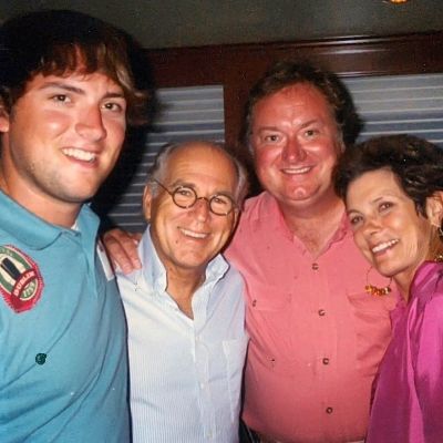 Tim Russet and his son with late singer, Jimmy Buffett.