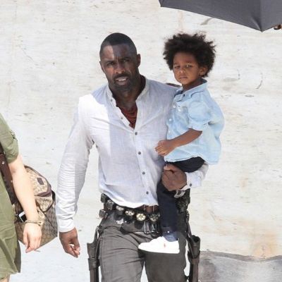 Winston Elba is being carried by his dad Idris.